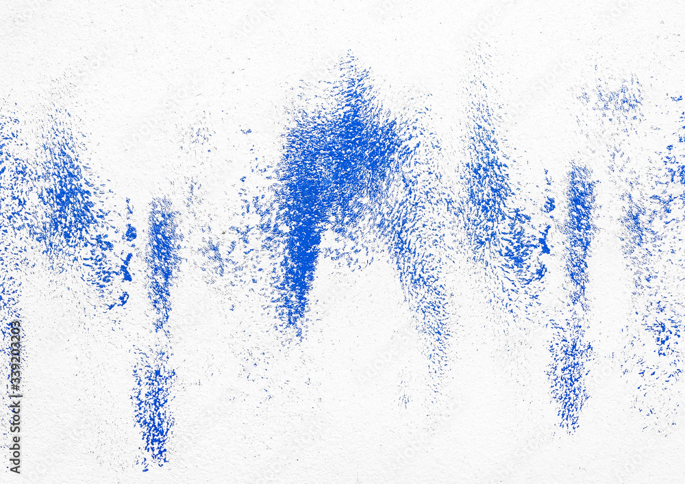 Blue paint abstract cold pattern on a white concrete wall texture background Blue paint abstract cold pattern on a white concrete wall texture background