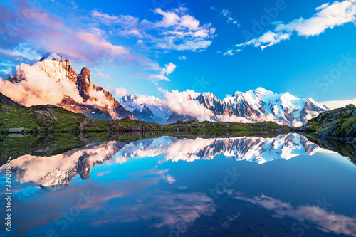 Magical sunset panorama of the Lac Blanc lake and Mont Blanc (Monte Bianco) on background, Chamonix location. Beautiful outdoor scene in Vallon de Berard Nature Reserve, France 