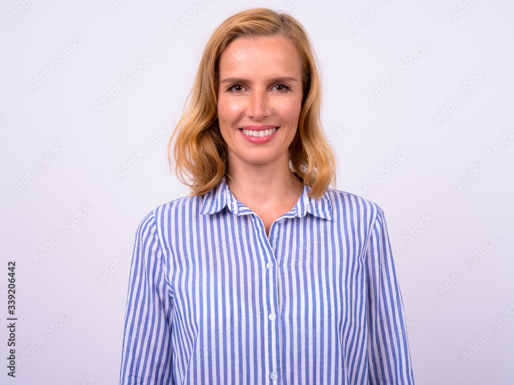 Portrait of happy beautiful blonde businesswoman smiling Portrait of happy beautiful blonde businesswoman smiling