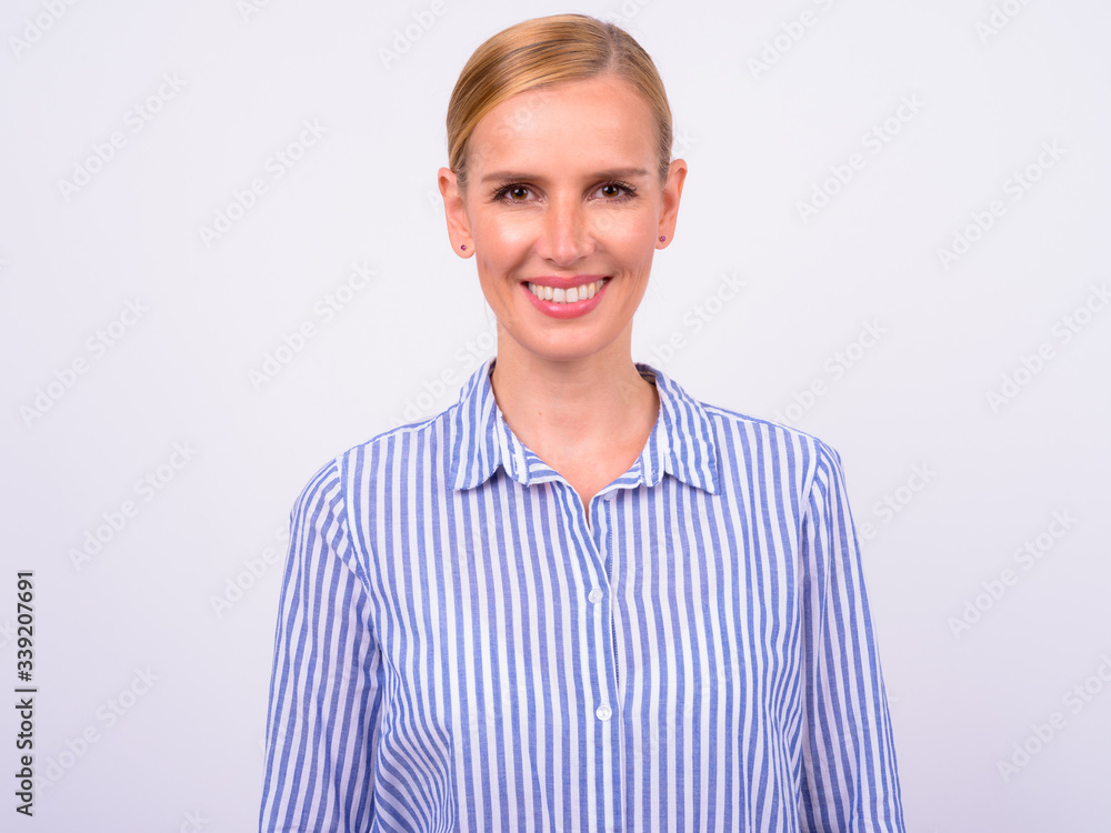 Portrait of happy beautiful blonde businesswoman smiling Portrait of happy beautiful blonde businesswoman smiling