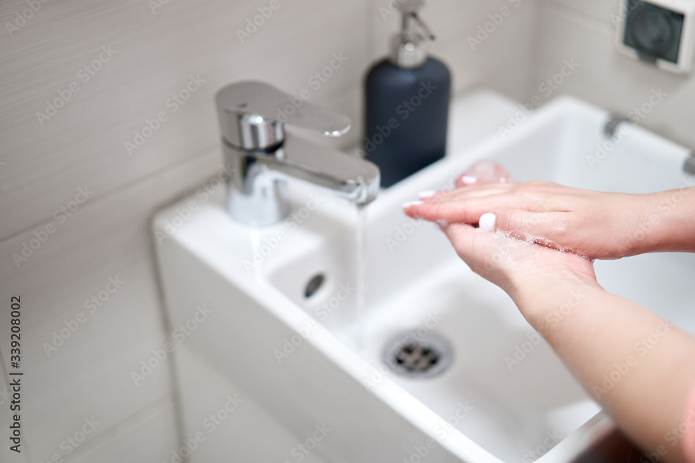 Fototapeta premium Washing of hands with soap under water
