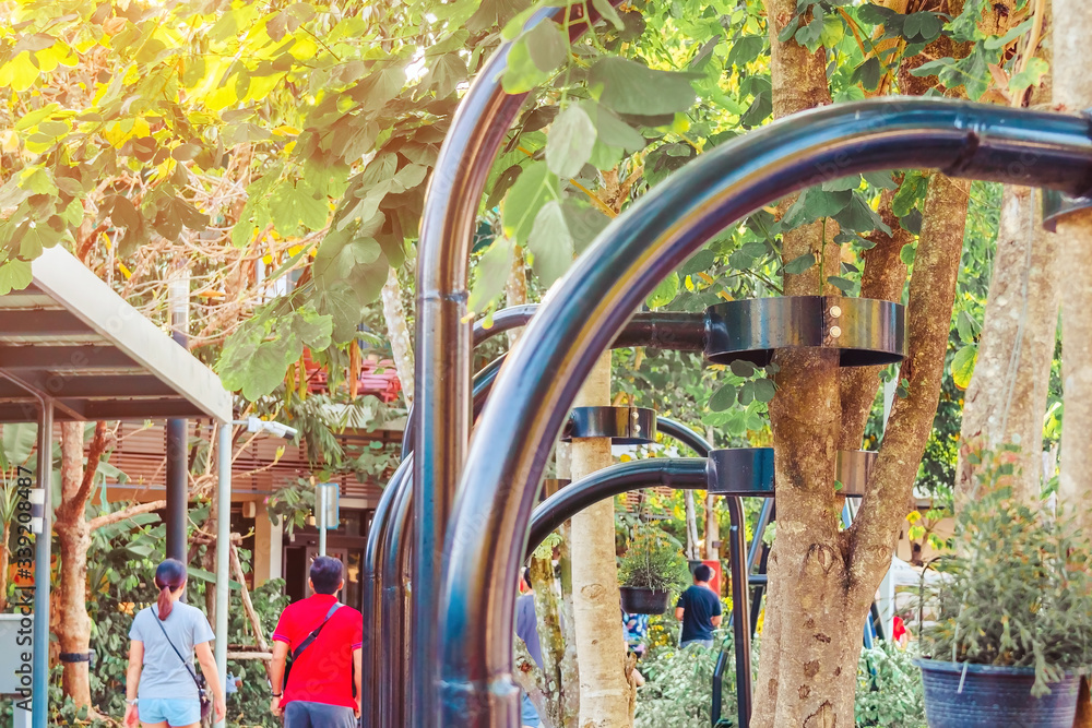 Black steel column supports and controls the branches and trunks of the tree to stand upright and beautiful in the park. Black steel column supports and controls the branches and trunks of the tree to stand upright and beautiful in the park.