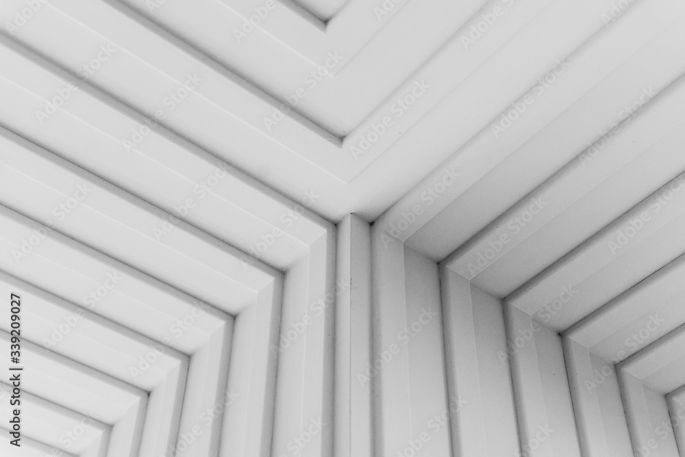 Obraz premium High resolution white abstract background for graphic design, application design.Volume diagonal lines.Soft convex wall panels, in light gray leather. High quality seamless realistic texture.