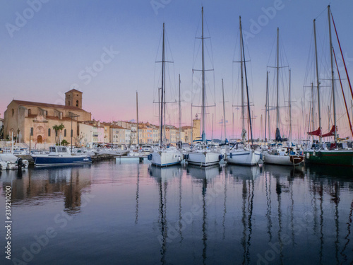 Sunset at old harbor in french city La Ciotat