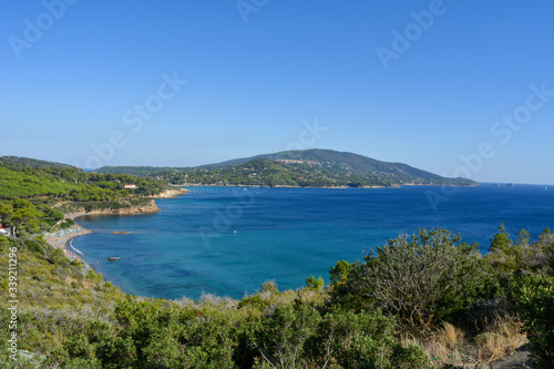 Aerial view of Norsi beach and Capoliveri hilltop town, on Elba Island. Tuscany, Italy © Renzo