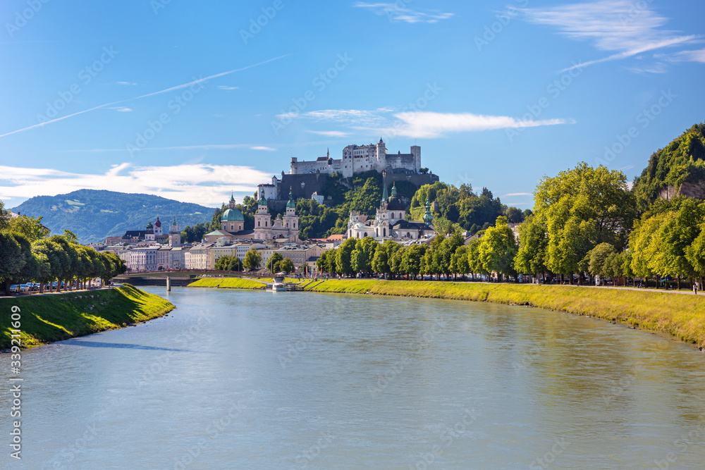 Fototapeta premium Sunrise view on Salzburg skyline with Festung Hohensalzburg old town in the summer, Salzburg, Austria