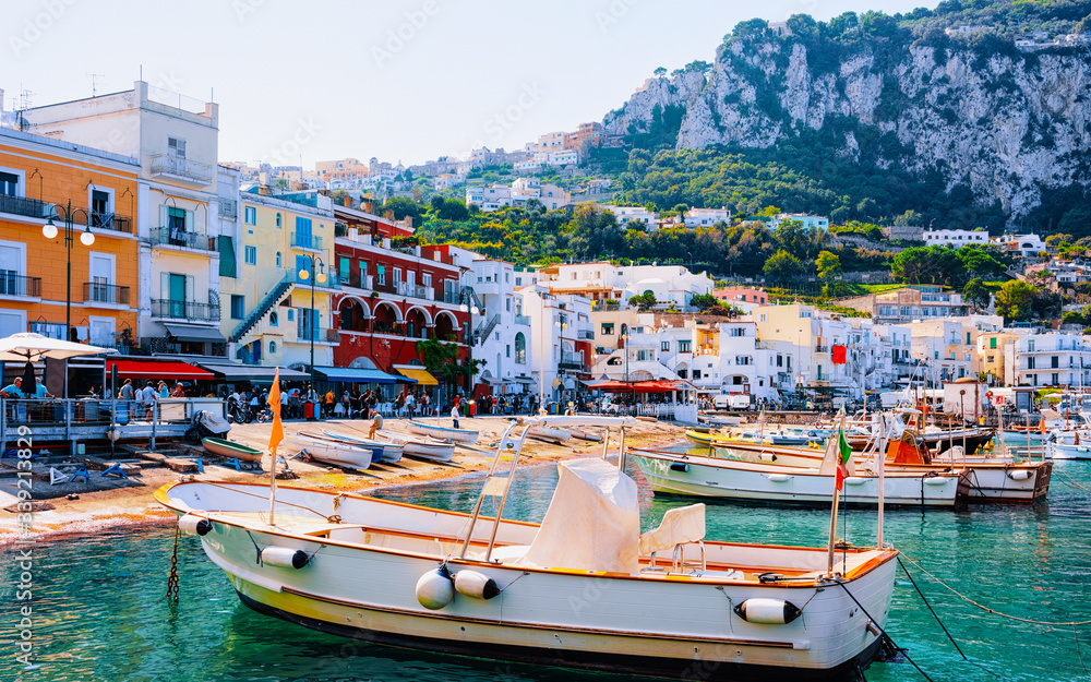 Marina with yachts at Capri Island town at Naples Italy reflex