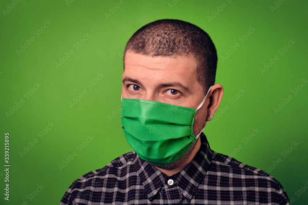 Man in a medical mask for protection against coronavirus. Man in a medical mask for protection against coronavirus.