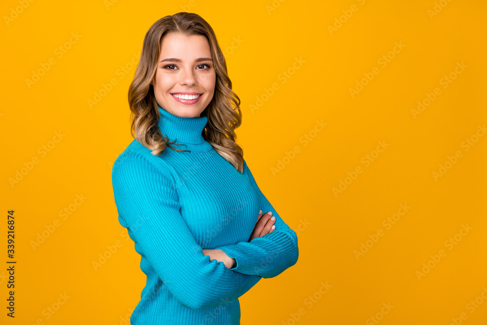 Profile photo of attractive business lady good mood beaming smile wavy hairdo arms crossed wear casual blue warm turtleneck isolated vibrant yellow color background Profile photo of attractive business lady good mood beaming smile wavy hairdo arms crossed wear casual blue warm turtleneck isolated vibrant yellow color background