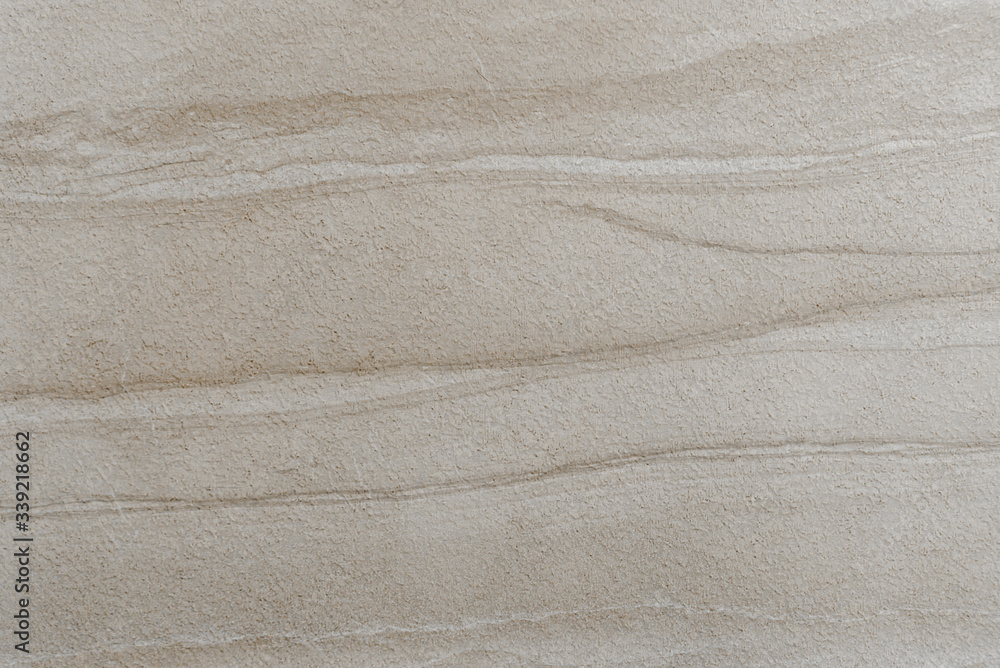 Naklejka premium Slate texture vinyl flooring a popular choice for modern kitchens and bathrooms,the use of dean marble for tile design as well as other backgrounds,