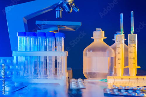 Empty test tubes next to mi...