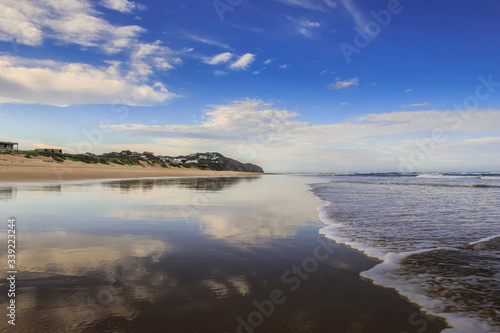 Reflective beach scene in Sedgefield, Kynsna, South Africa.