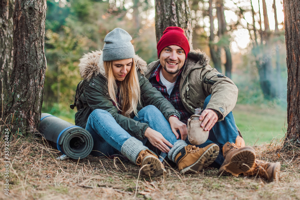 Travel couple camping in the forest. Concept of trekking, adventure and seasonal vacation. Travel couple camping in the forest. Concept of trekking, adventure and seasonal vacation.
