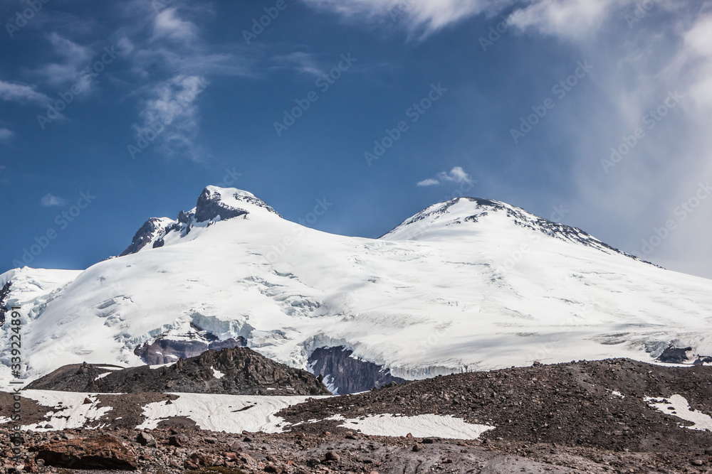 high mountains covered with snow and ice, peaks and valleys in the Caucasus. Peak Elbrus