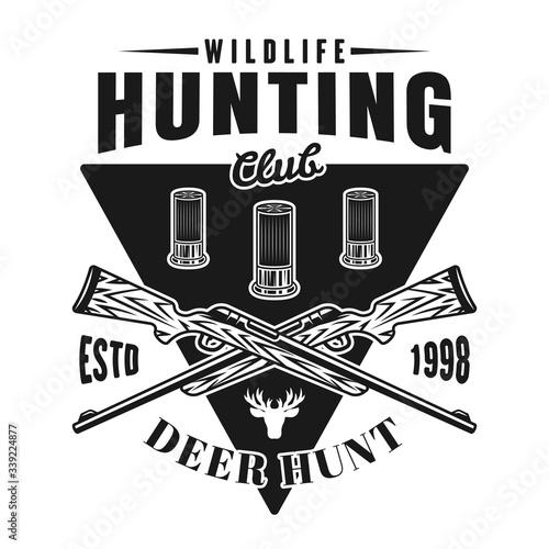 Hunting club vector emblem with two crossed rifles