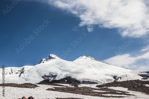 high mountains covered with snow and ice, peaks and valleys in the Caucasus. Peak Elbrus © yuliagubina