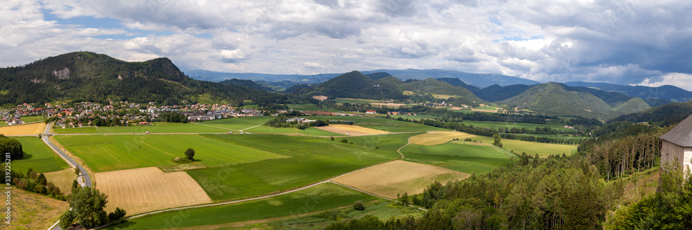 panoramic view of the village, mountains, agricultural fields from above