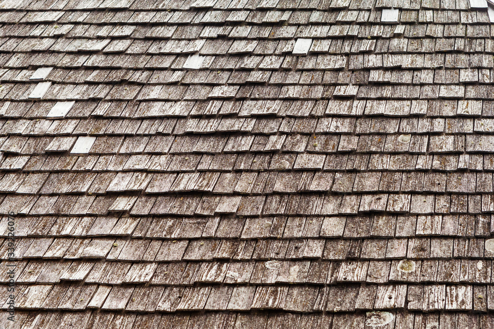 background, the roof of the old house of the house is covered with wooden tiles background, the roof of the old house of the house is covered with wooden tiles