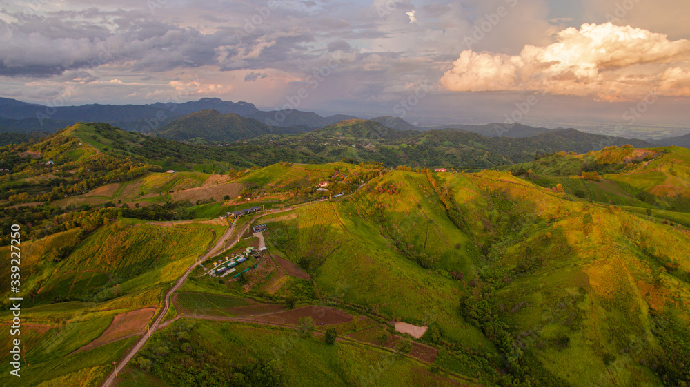 Naklejka premium green mountain topview from dronePs. Public Domain
