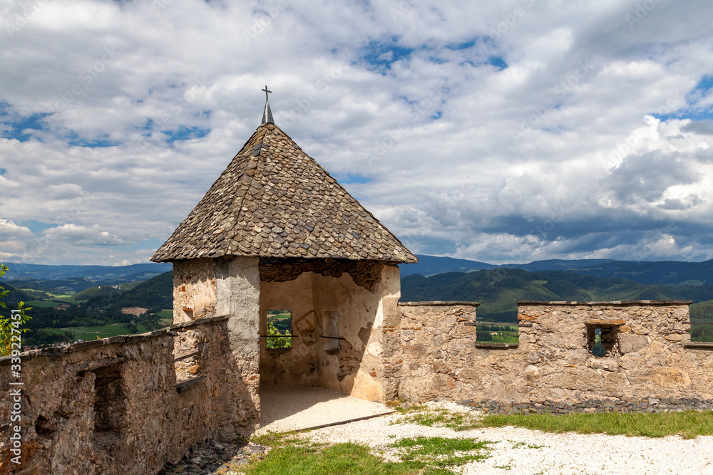 Fototapeta premium view of the Alps and the castle tower, Austria