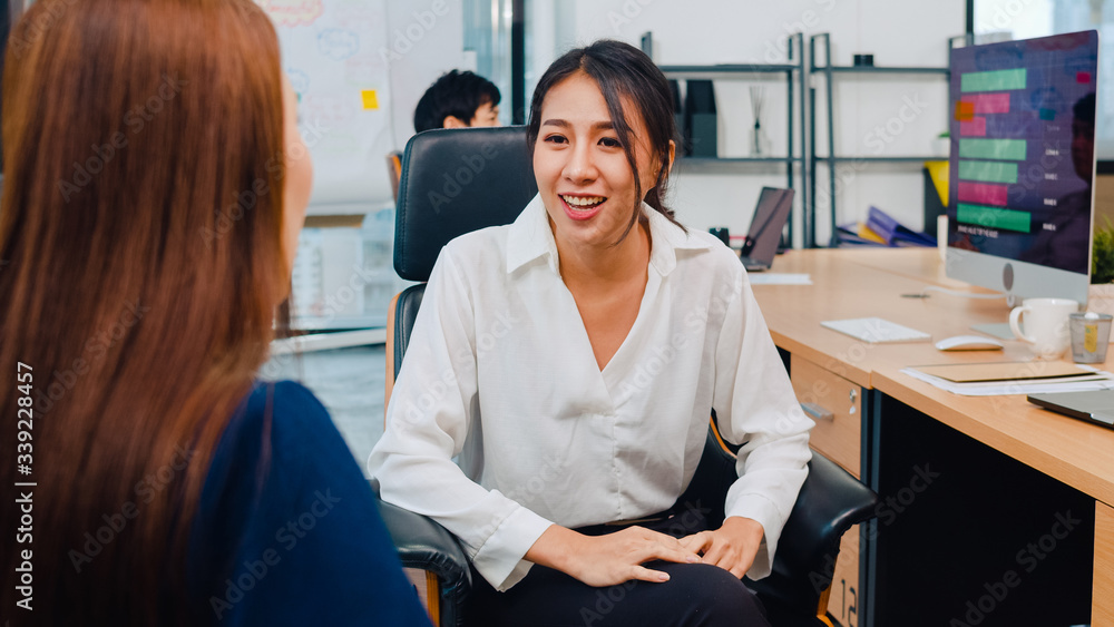 Asia businesspeople chatting to intern discussing job interview colleagues having conversation and communication meeting brainstorming ideas about project working plan success strategy in office. Asia businesspeople chatting to intern discussing job interview colleagues having conversation and communication meeting brainstorming ideas about project working plan success strategy in office.