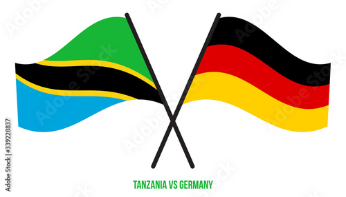 Tanzania and Germany Flags Crossed And Waving Flat Style. Official Proportion. Correct Colors