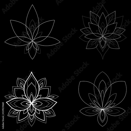 Set of four ethnic Mandala ornaments on black background. Henna tattoo design. Vector illustration