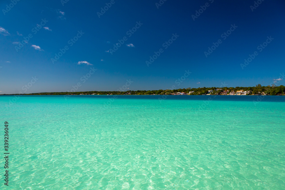 Laguna de Bacalar is also known as the Lagoon of Seven Colors, in Bacalar, Mexico. Laguna de Bacalar is also known as the Lagoon of Seven Colors, in Bacalar, Mexico.