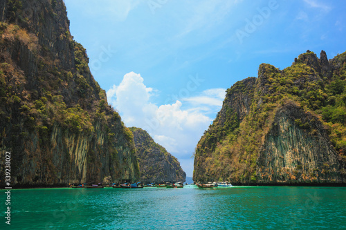 Beautiful mountain in the sea with boat at Krabi ,South of Thailand