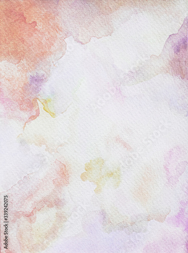 Abstract marble fluid art with purple yellow and pink paint on paper background