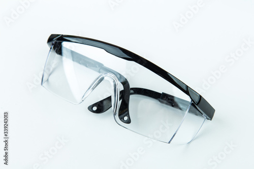 Safety Glasses isolated on white background. Selective focus.