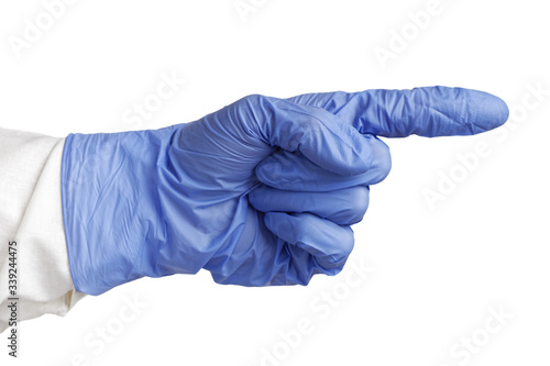 A human hand with pointing finger in a blue medical glove. Isolated on white.