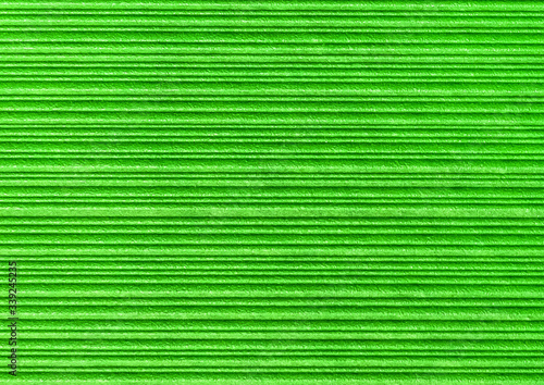 Green abstract wallpaper striped texture, paper horizontal lines pattern background