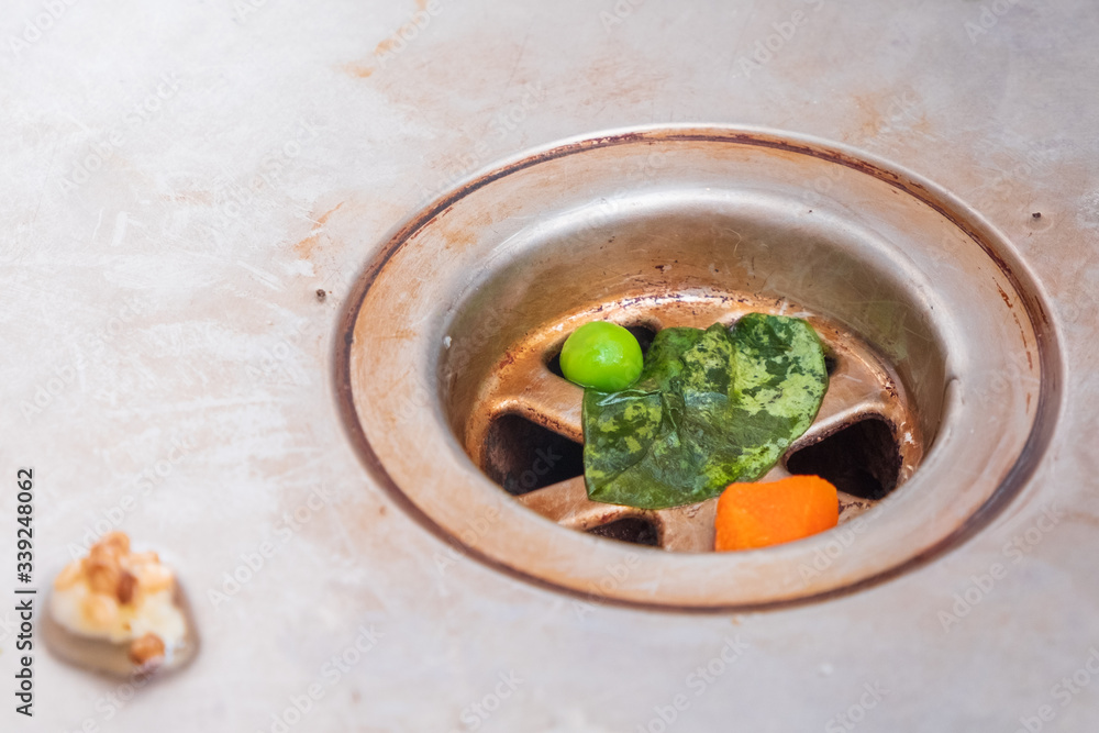 Sink sink clogged with vegetables Sink sink clogged with vegetables