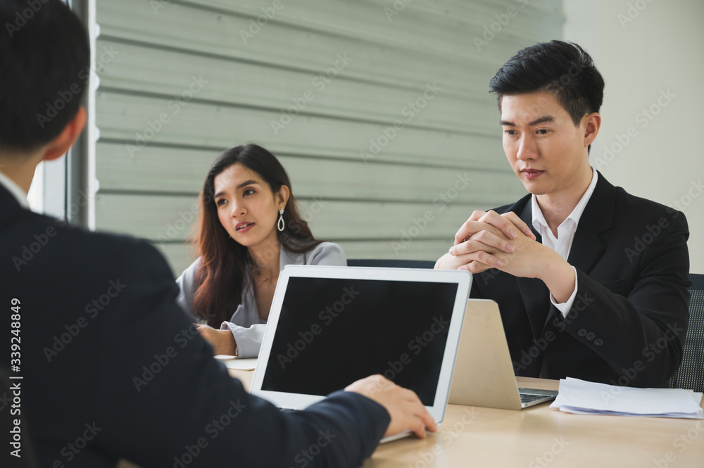 Asian business people team analyzing statistics financial. Team of businesspeople Meeting Conference Discussion Corporate Concept in office. Asian business people team analyzing statistics financial. Team of businesspeople Meeting Conference Discussion Corporate Concept in office.