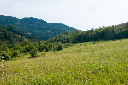 Noon in the mountains of the Caucasus - horizontal photo - mountain landscape.
