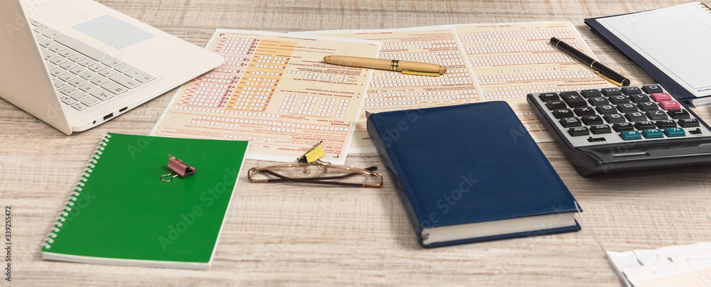 Australian tax declaration and pen on wooden table Australian tax declaration and pen on wooden table