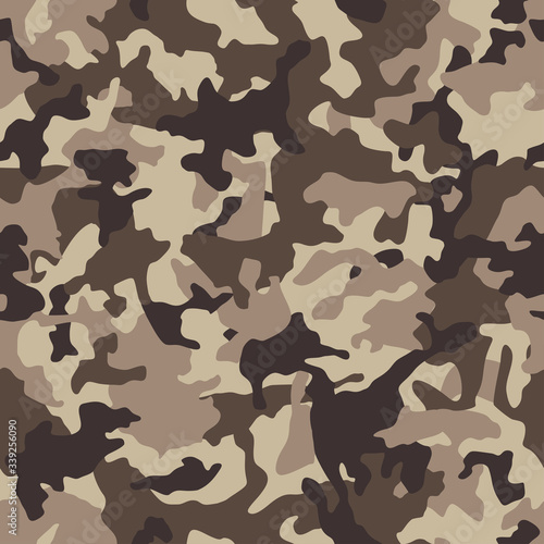 Camouflage pattern background seamless vector illustration. Classic clothing style masking camo repeat print. Beige, brown, ocher colors forest texture. 
