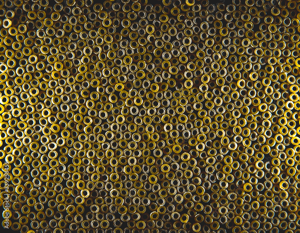 pasta anellini on a black background pasta anellini on a black background