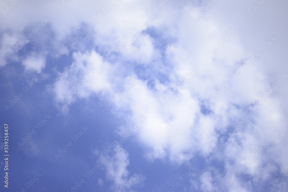 Obraz premium Background. Blue sky with white clouds. Place for text.