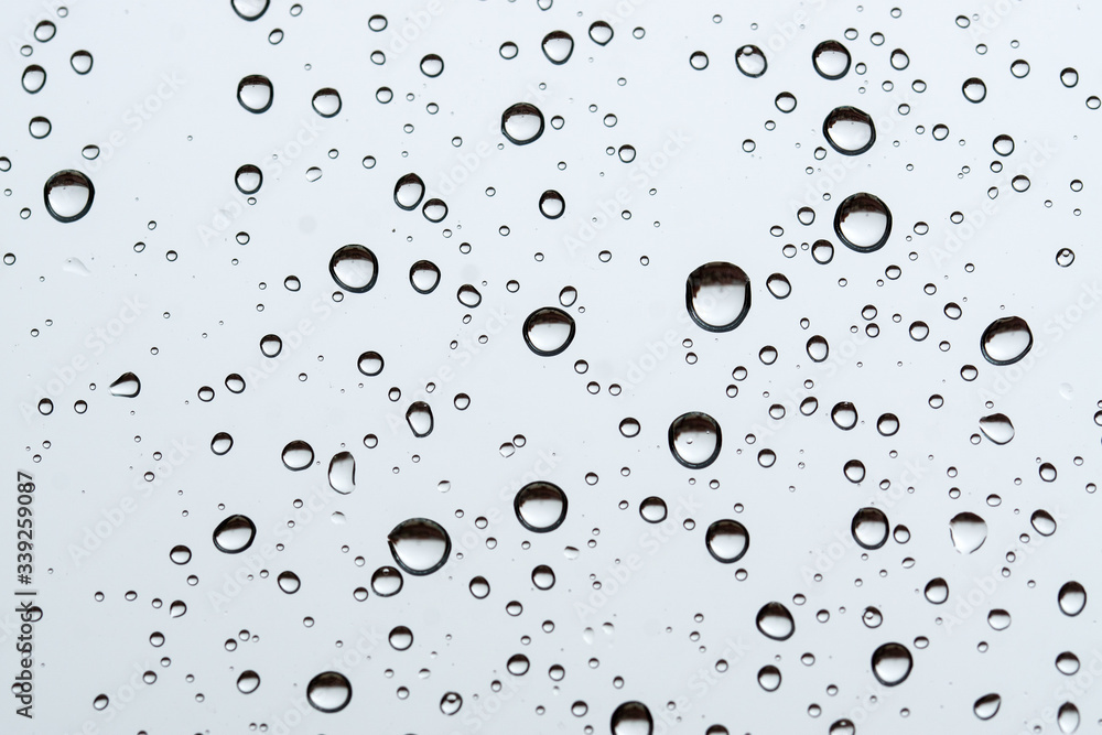 Close up of a Window with raindrops in a stormy day Close up of a Window with raindrops in a stormy day