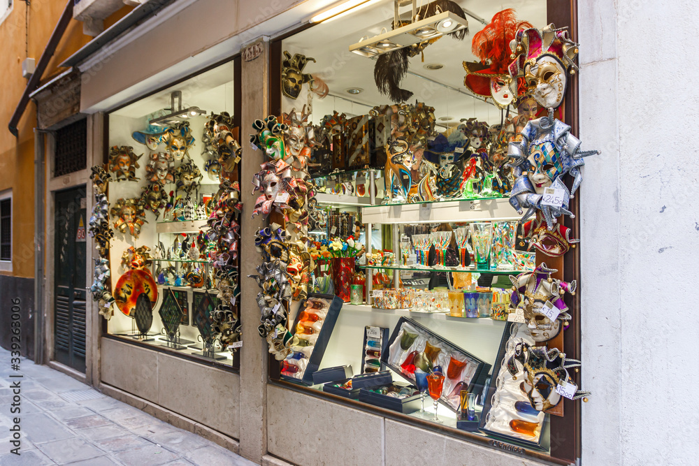 Old town of Venice. A showcase of a souvenir shop on a narrow street away from Piazza San Marco in Venice, Italy
