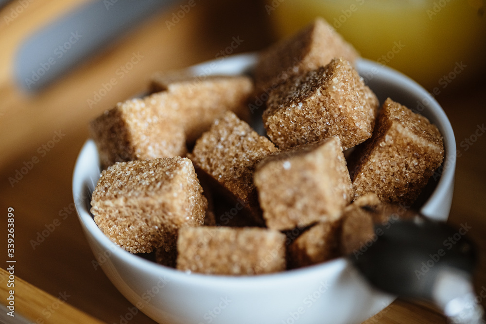 Close up photo of brown sugar bricks in a bowl, stylish food photo Close up photo of brown sugar bricks in a bowl, stylish food photo