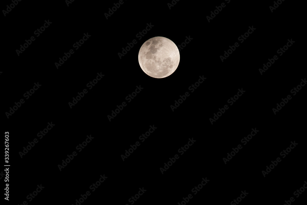 The moon that is partially covered by the shadow of the world. The moon that is partially covered by the shadow of the world.