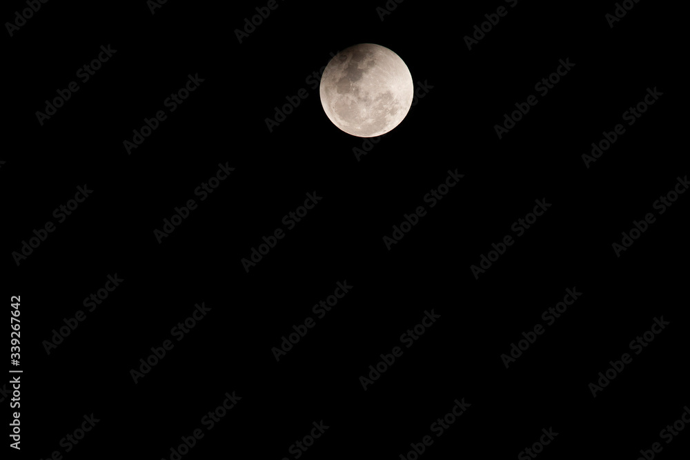 The moon that is partially covered by the shadow of the world. The moon that is partially covered by the shadow of the world.
