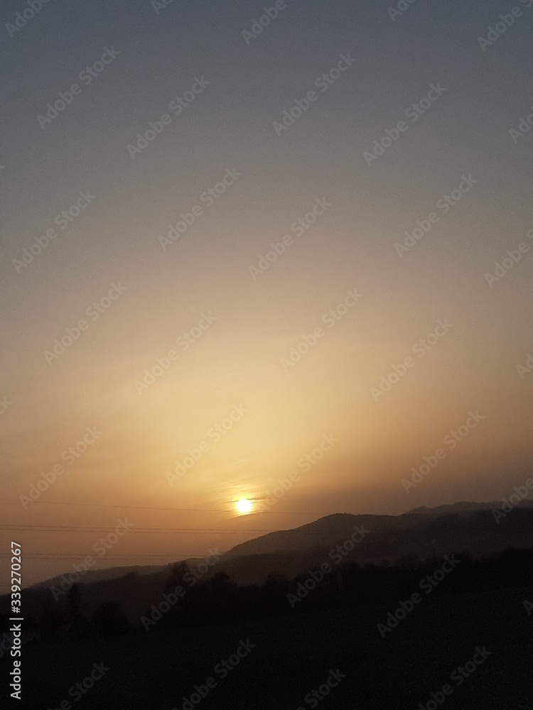 Obraz premium sunset over the mountains