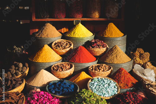 Colorful spices at a traditional market in Marrakech, Morocco