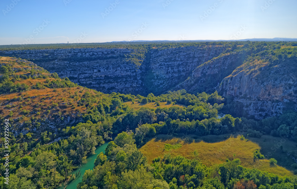 Aerial view of the Krka River canyon located downstream of Bilusic buk on the exit from of in Promina County.