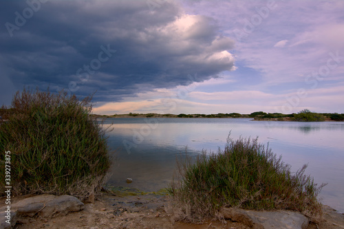Fototapeta Naklejka Na Ścianę i Meble -  Lake with calm waters after the storm