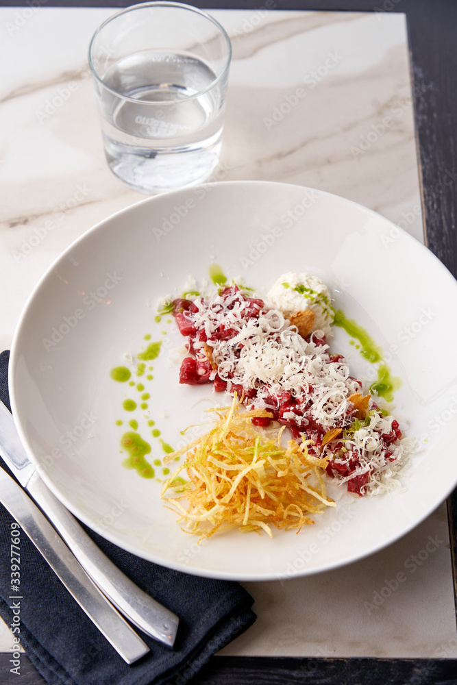 Free range beef tartare, parmesan mousse and parsley oil Free range beef tartare, parmesan mousse and parsley oil